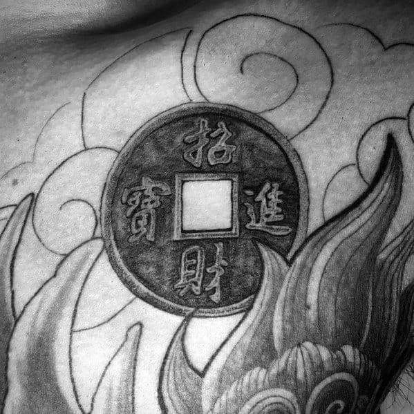 Intricate tattoo of an ancient Chinese coin with a square hole, surrounded by swirling patterns, symbolizing prosperity and wealth.