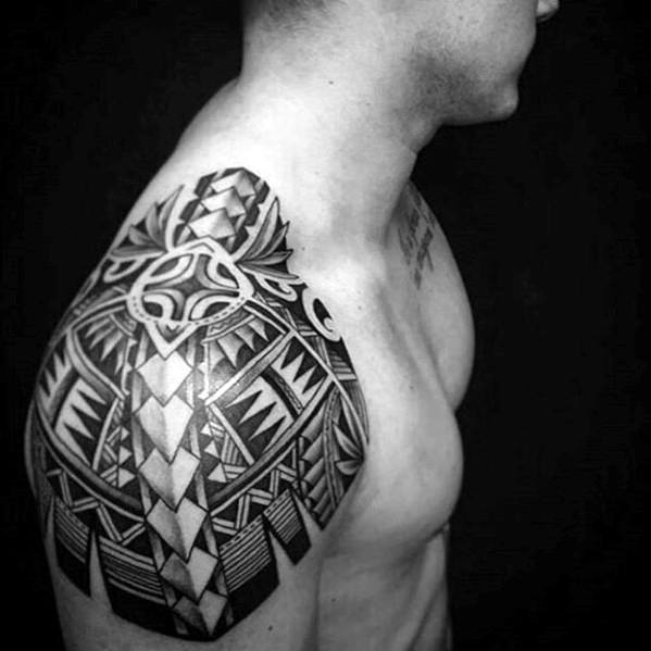 Distinctive Male Awesome Shoulder Tribal Tattoo Designs