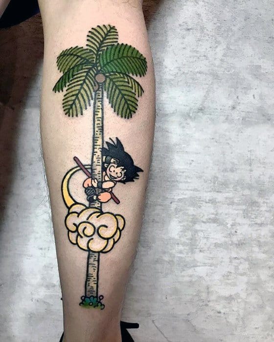 Playful Goku tattoo from Dragon Ball riding Flying Nimbus, circling a palm tree that doubles as a height chart on the leg.