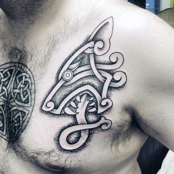 Chest tattoo featuring a Celtic wolf design with swirling knotwork patterns and dotwork shading, in black and grey ink