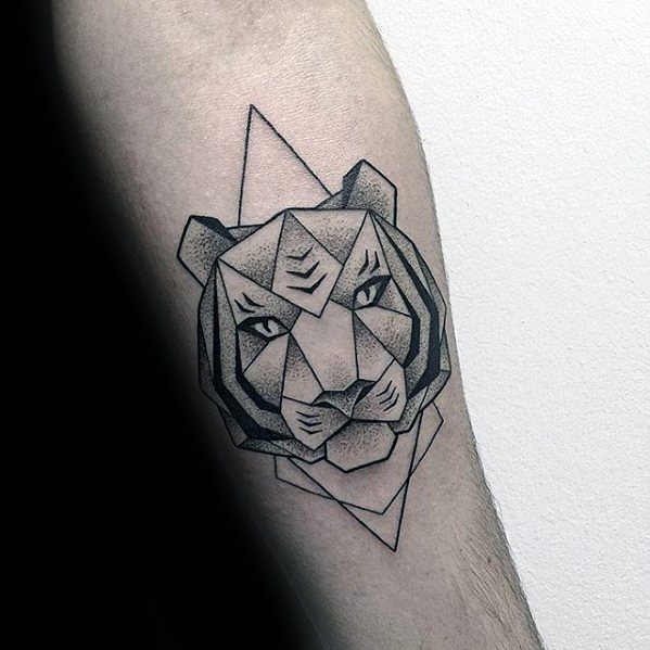 Geometric tiger head tattoo on forearm, featuring sharp angular lines and dotwork shading for a sleek, modern design.