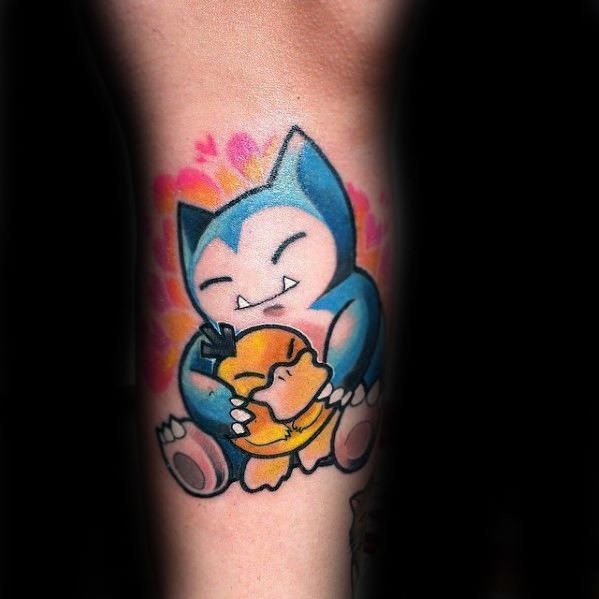 Colorful tattoo of Snorlax hugging Psyduck with a background of pink hearts and warm orange glow on forearm.