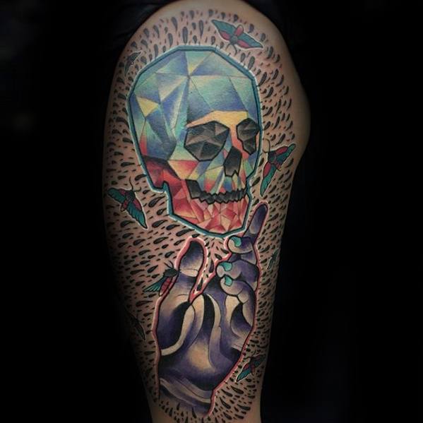 Colorful geometric skull floating above a stylized purple hand with scattered knives and abstract background elements.