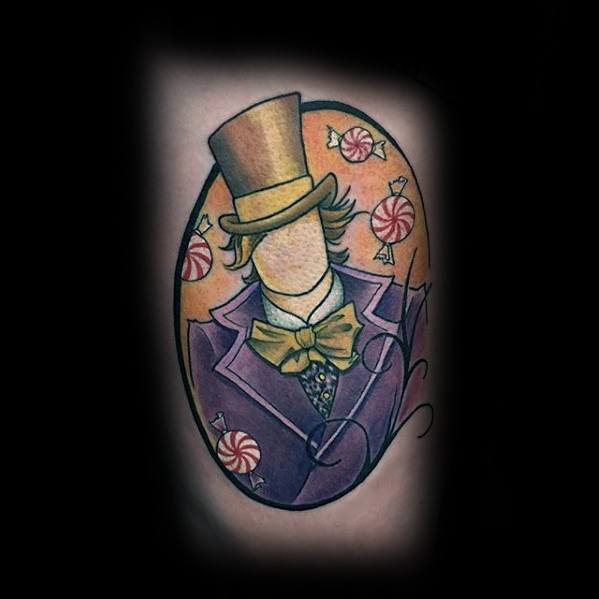 Minimalist Willy Wonka tattoo with a faceless figure in a purple coat and top hat, surrounded by candy pieces on an orange background.