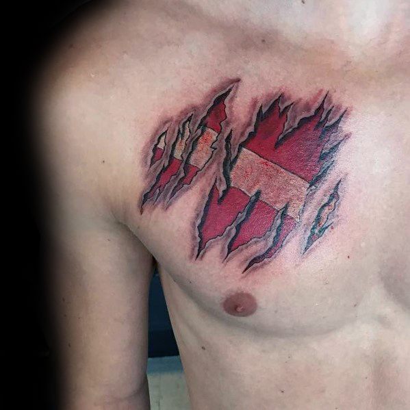 Tattoo of torn skin revealing a red and white dive flag underneath, symbolizing a deep passion for scuba diving and an unbreakable connection to the ocean.