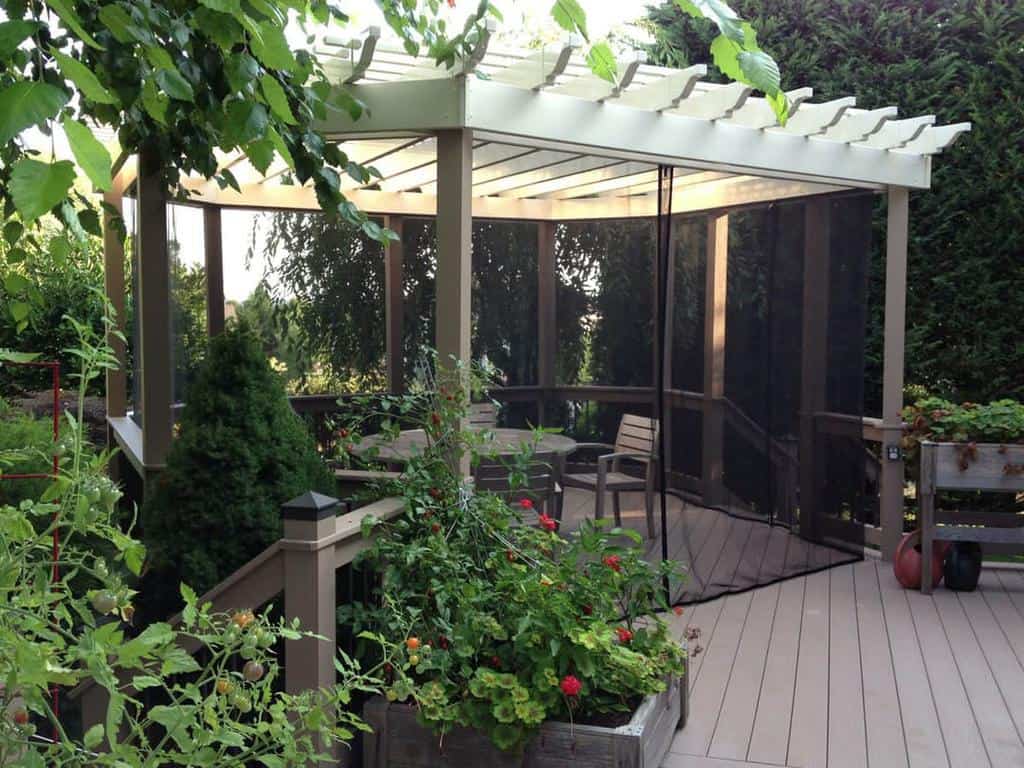 backyard gazebo fly screen wood deck plants