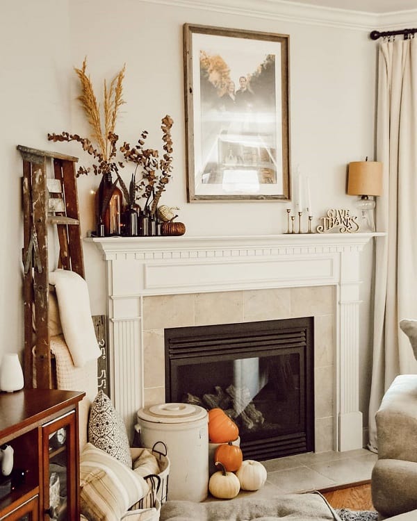 rustic boho fireplace with ladder decoration