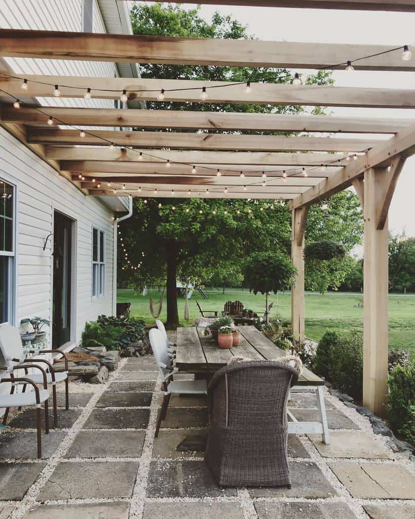 diy wood patio awning with fairy lights 