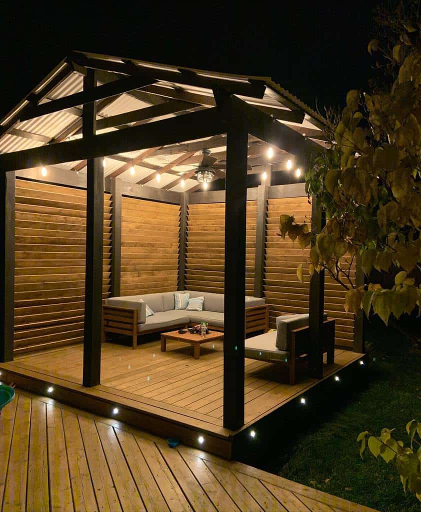 modern wood deck patio with gazebo and simple furniture
