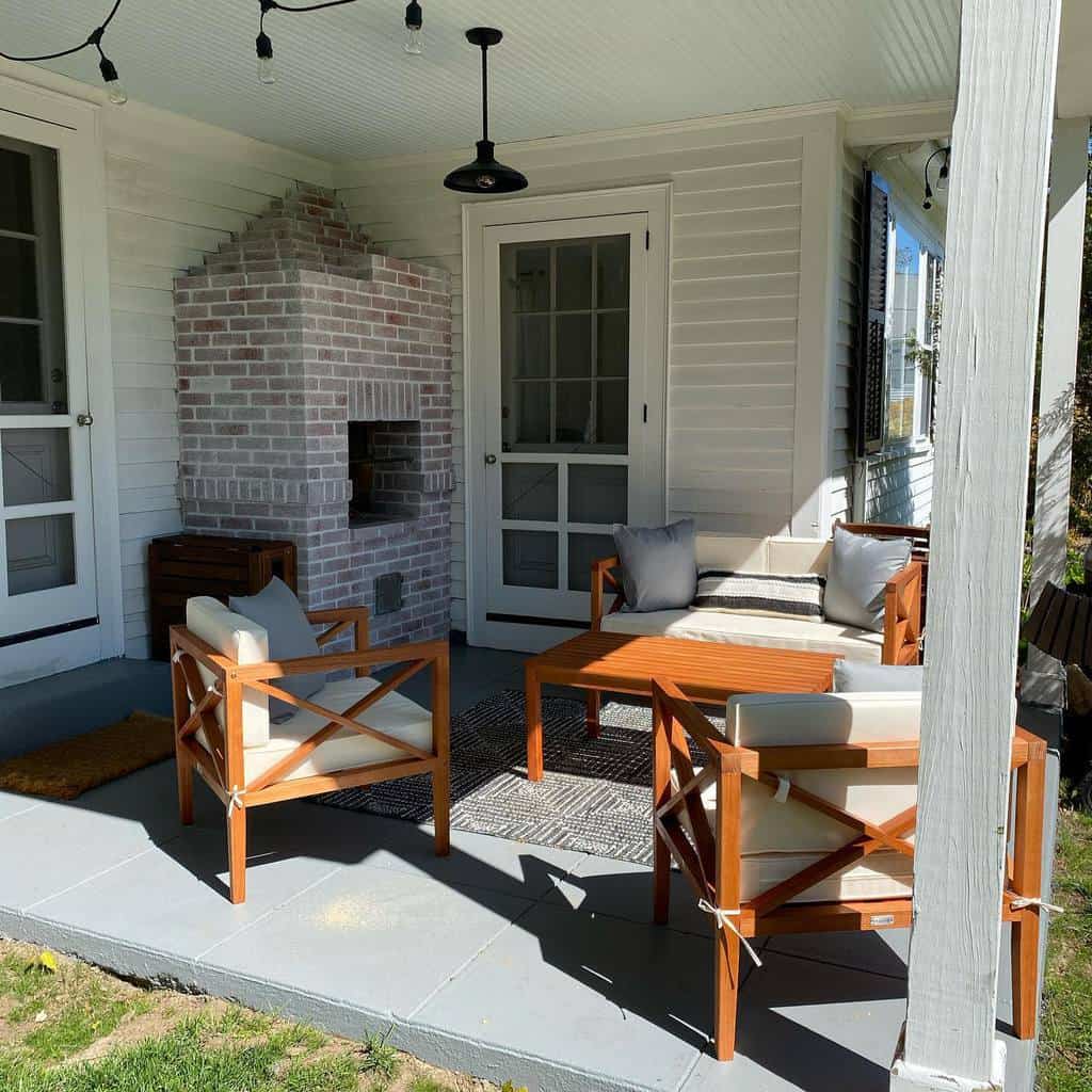 small covered patio with brick pizza over