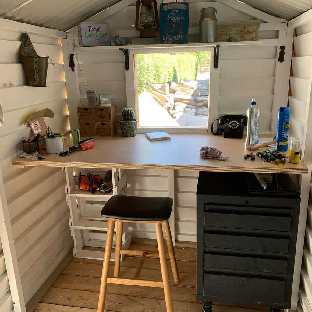 small work area in she shed