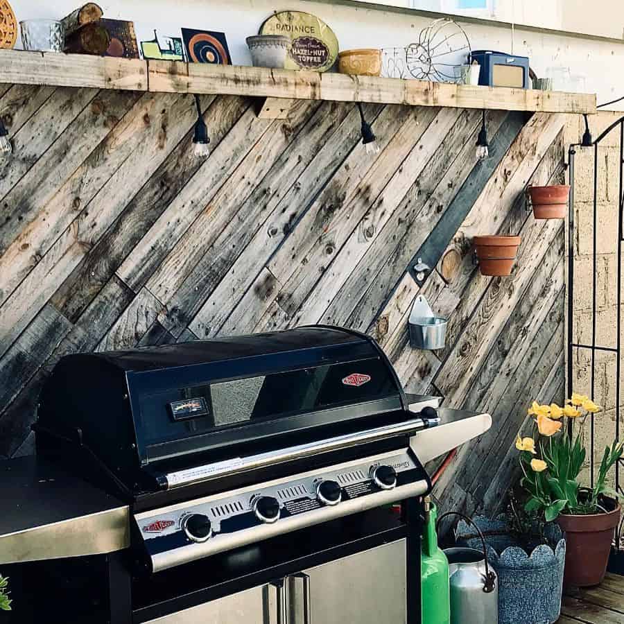 wood wall covering outdoor patio bbq