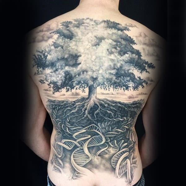 A detailed back tattoo of a tree with roots intertwined with DNA strands