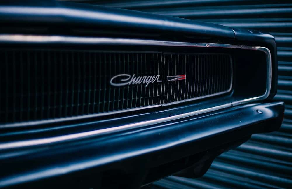 photo of the grill of a dodge charger, focusing on the charger logo