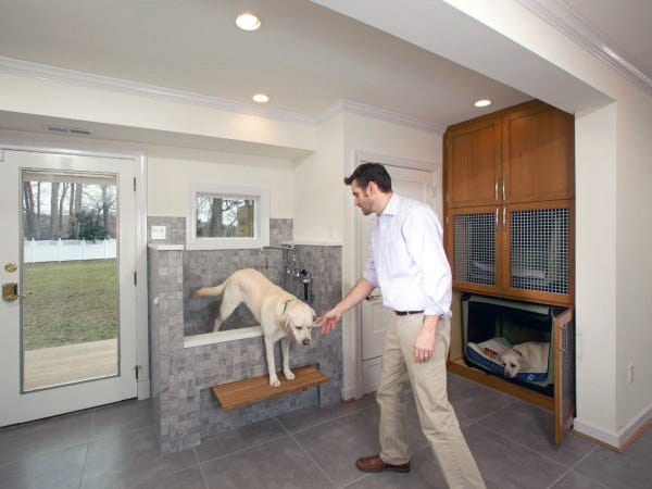 dog room with shower and built-in dog houses