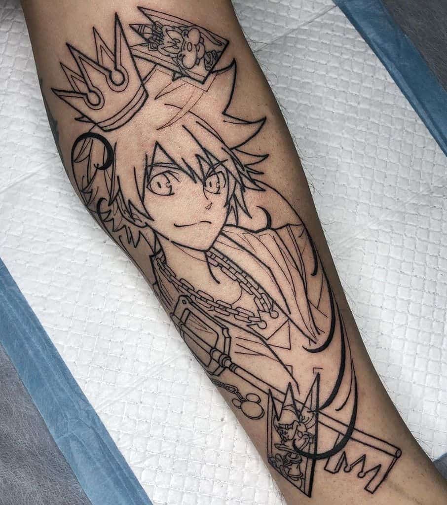 Black ink linework tattoo of Sora from Kingdom Hearts on the forearm, featuring a crown, Keyblade, and intricate chain details.