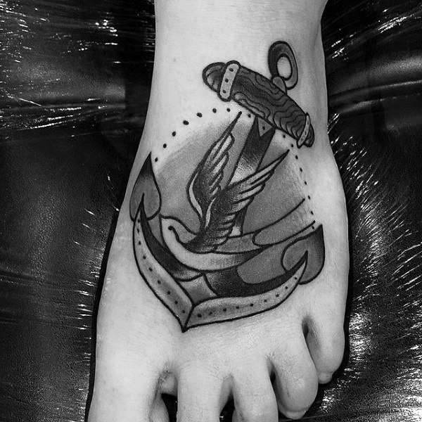 Dotted Bird And Anchor Tattoo On Foot