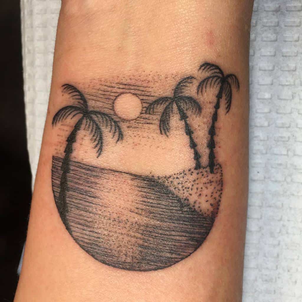 Minimalist black ink tattoo of a tropical beach scene with palm trees, ocean, a sun, and sand dunes, enclosed within a circular frame