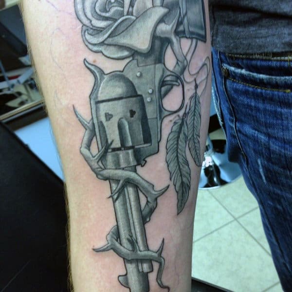 Double Barelled Pistol With Vines Tattoo On Forearms For Guys