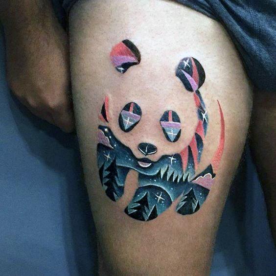 Creative panda tattoo formed by negative space, revealing a night landscape with stars, mountains, and pink-tinted sky inside the shape.