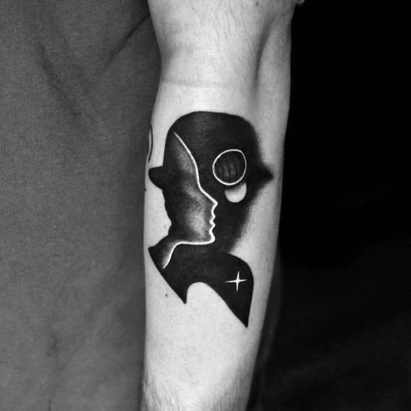 Minimalist blackwork tattoo of overlapping profiles, stars, and a moon, blending human connection with cosmic and surreal elements.