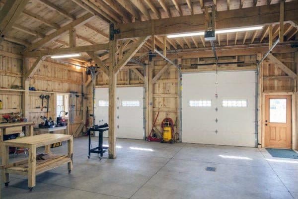 double garage door wood workshop concrete floor workbench