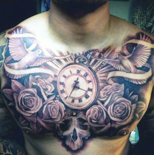 Chest tattoo featuring a clock with Roman numerals, surrounded by roses, two birds, and a skull