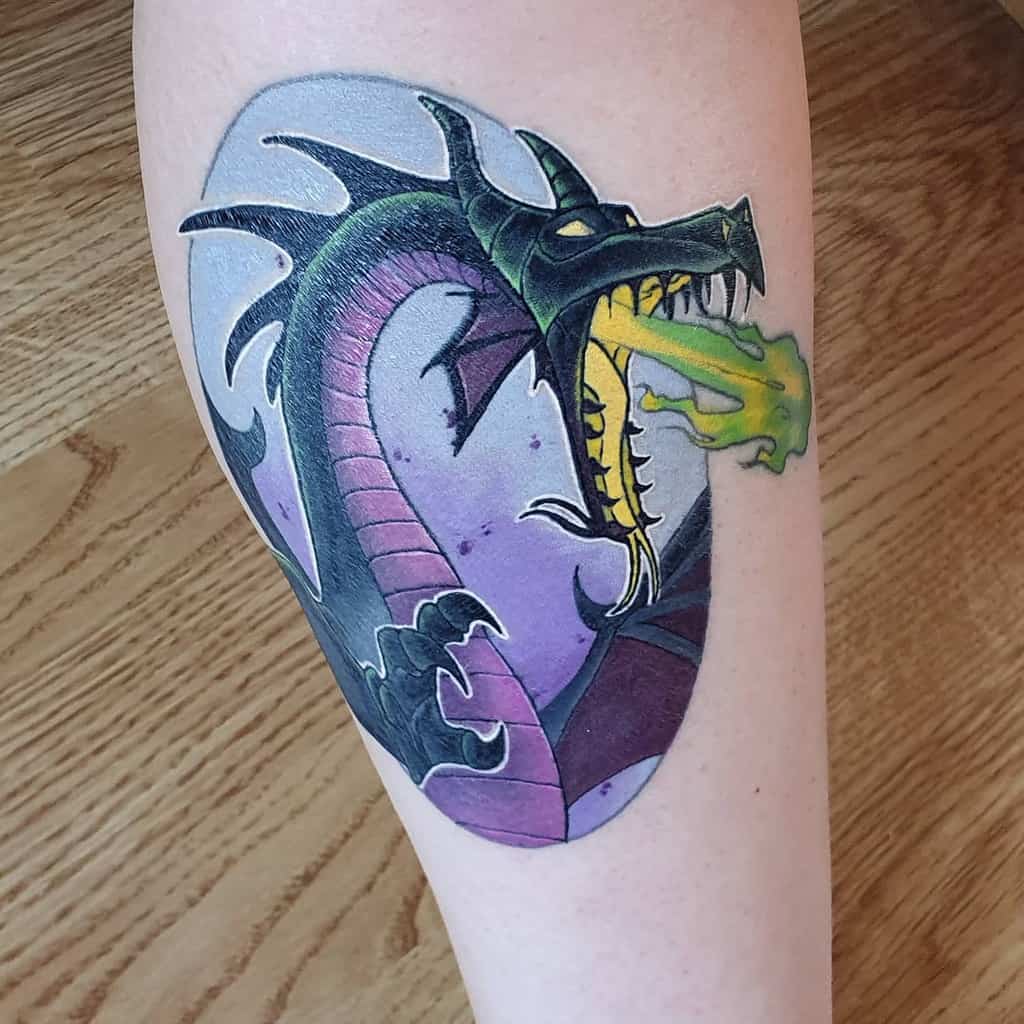 Dynamic Maleficent dragon tattoo, showcasing vivid colors and fiery breath, bringing this classic villain’s transformation to life