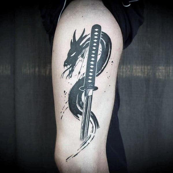Tattoo of a dragon coiled around a sword on an upper arm