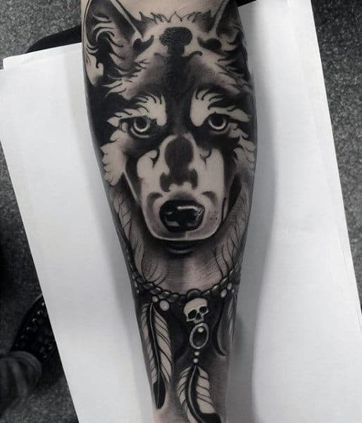 Dreamcatcher Tattoo Design On Mans Forearm With Wolf