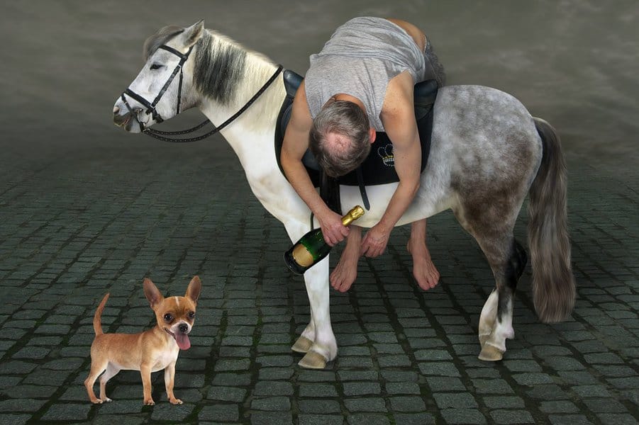 drunk man with a bottle of champagne