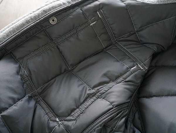 Durable Stiching Details On Interior Nau Utility Wool Down Jacket In Cape Heather