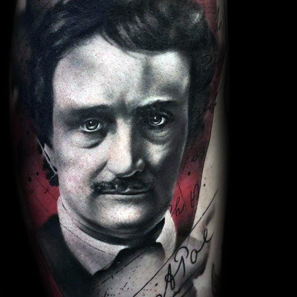 Realistic Edgar Allan Poe tattoo with striking eyes, red background, and script-style text featuring his signature.
