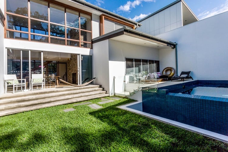 elegant above ground pool and deck