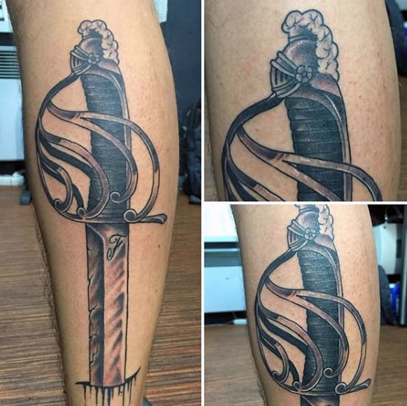 Elegant Guys Swords Tattoo On Leg