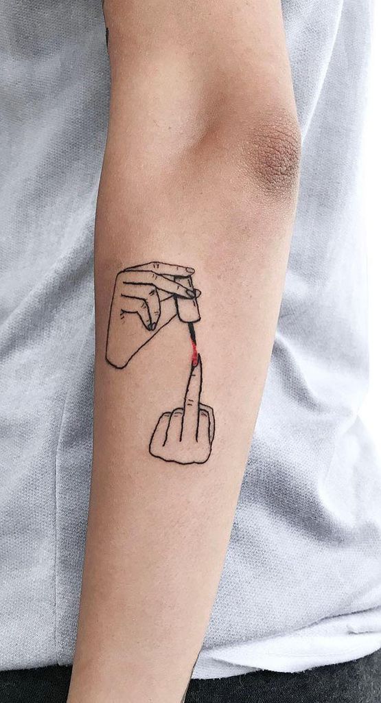 A minimalist black ink tattoo of a hand painting red nail polish on an extended middle finger, creating a bold and cheeky design.