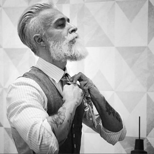 Elegant Slicked Back Hairstyle For Older Aged Gentlemen