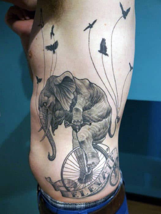 Elephant On Wheels In A Circus Tattoo Males Torso