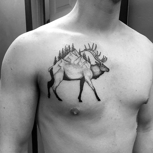 Black and grey elk tattoo on the chest, featuring a landscape within its body, blending mountains and trees for a nature-inspired design.