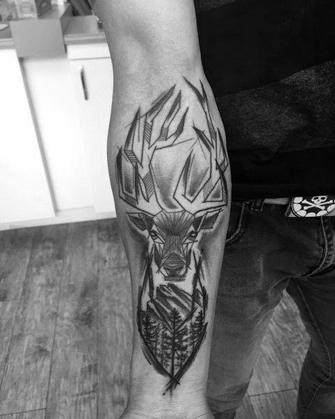 Geometric elk tattoo on the forearm, featuring bold angular antlers, intricate shading, and a forest design for a modern and striking look.