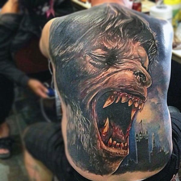 Enormous Open Mouhted Werewolf Man Tattoo On Male Full Back