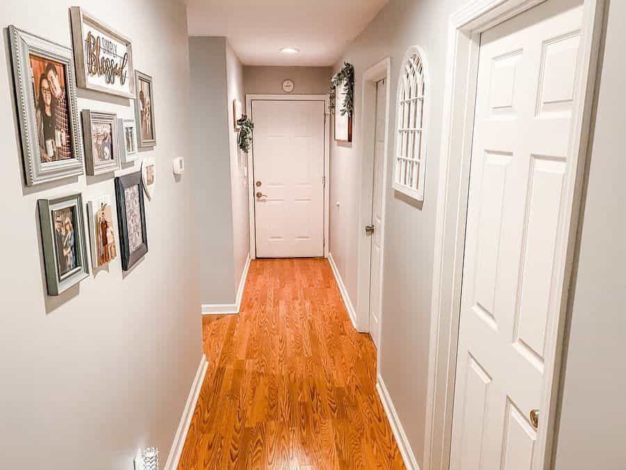 rustic hallway with hardwood flooring