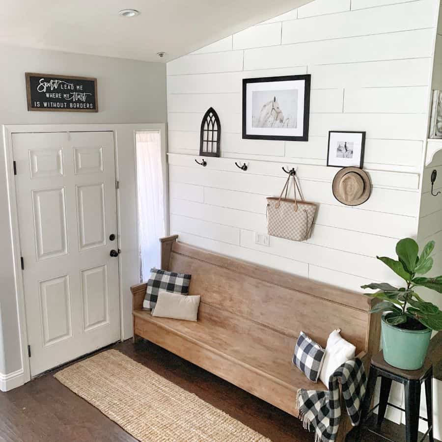 small shiplap wall farmhouse entryway with bench seating