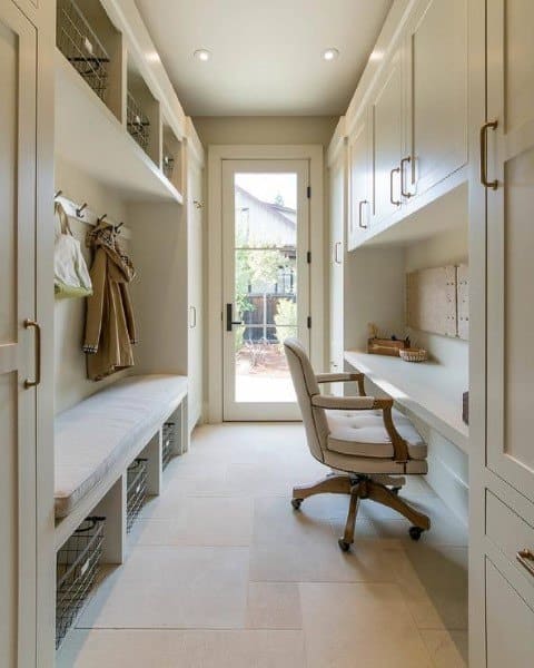white cabinet mudroom with desk and bench seating