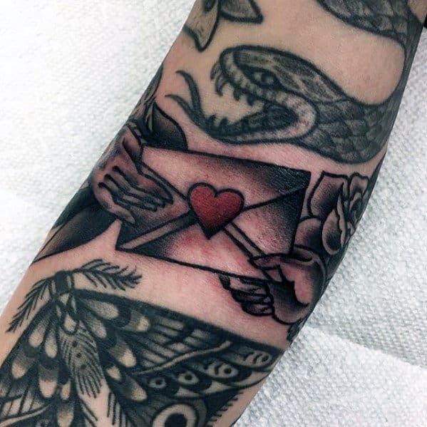 Envelope With Heart Ditch Tattoo Design On Man