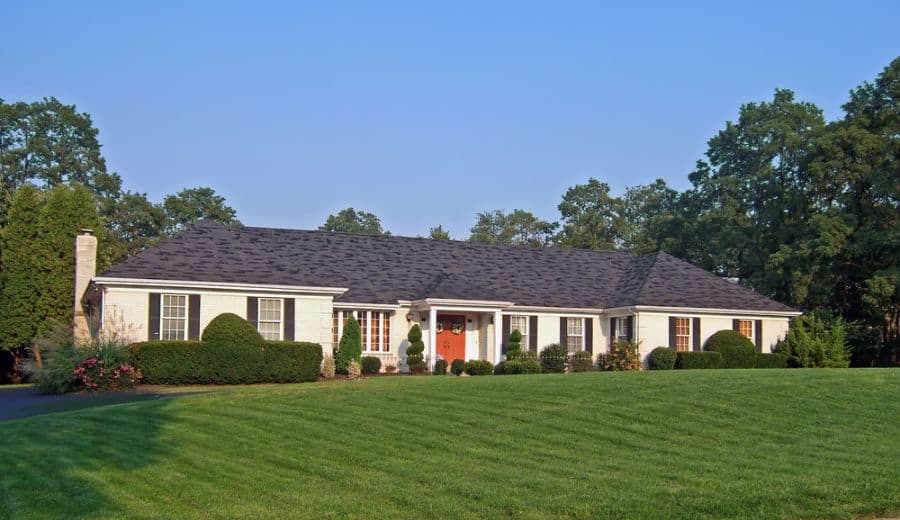 luxury estate with mowed grass