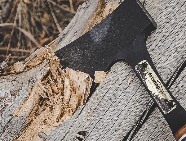 Estwing Special Edition Hatchet Chopping Into Wood Log