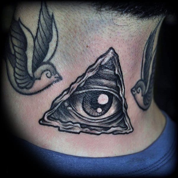 Throat tattoo featuring a detailed all-seeing eye within a torn triangle, shaded in black and gray, flanked by two soaring birds