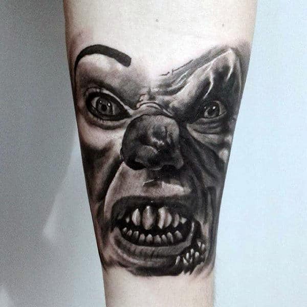 Evil Clown Shaded Black And Grey Ink Male Tattoo Designs On Inner Forearm