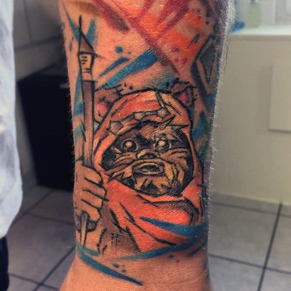 Sketch-style Ewok tattoo with vivid orange, blue, and red brushstroke accents, holding a spear with a bold, expressive look.
